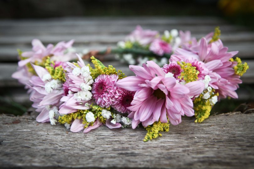 Flower crown made with purple chrysanthemums, lavender daisies, solidago and baby's breath | created by Natasha Price of Alaskaknitnat.com