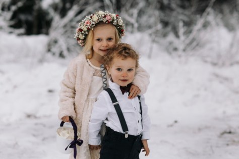 Flower girl adorned with a crown of baby's breath and spray roses | designed by Natasha Price and Photo by Grace Adams Photography