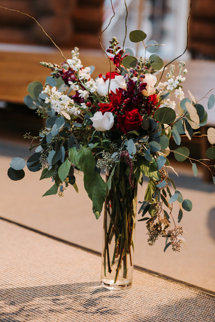 red and white altar arrangement designed by Natasha Price of Alaskaknitnat.com | photo by Grace Adams Photography