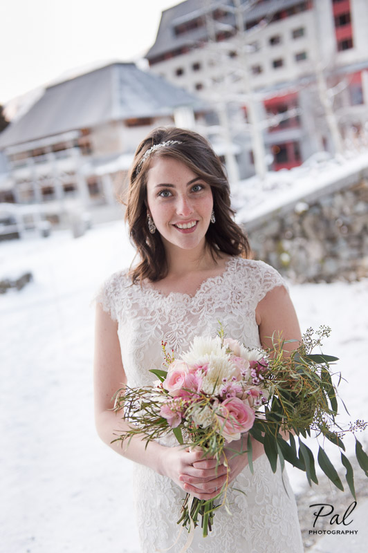Winter weddings: a bridal bouquet with eucalyptus, alstroemeria, roses, spider mums, carnations and wax flower. Designed by Natasha Price of Alaskaknitnat.com