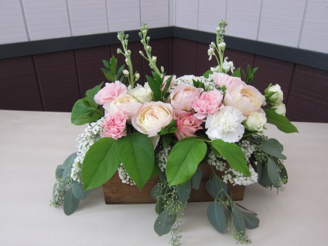 Wedding centerpieces made with blush garden roses, lisianthus, carnations, queen anne's lace, stock, alestroemeria and myrtle | Wedding flowers designed by Natasha Price of Alaskaknitnat.com