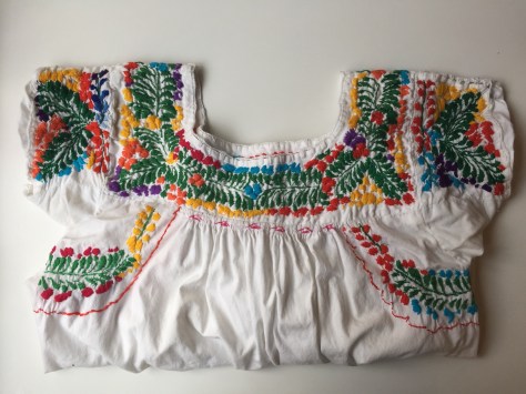 DIY Frida Kahlo Costume | Be colorful and support women with disabilities this Halloween with this easy costume. Flower crown tutorial included from Alaskaknitnat.com