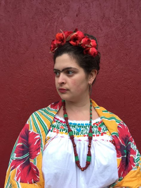 DIY Frida Kahlo Costume | Be colorful and support women with disabilities this Halloween with this easy costume. Flower crown tutorial included from Alaskaknitnat.com