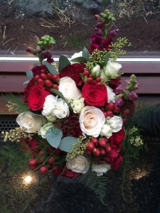 Alaska Winter Wedding | White and red roses, white and burgundy carnations, eucalyptus, red snapdragon, red hypericum, plumosa and spray roses. The perfect holiday bouquet from alaskaknitnat.com