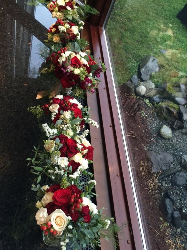Alaska Winter Wedding | White and red roses, white and burgundy carnations, eucalyptus, red snapdragon, red hypericum, plumosa and spray roses. The perfect holiday bouquet from alaskaknitnat.com