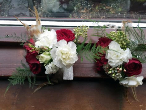Alaska Winter Wedding |spray rose, white statice, carnation, eucalyptus, festive corsage. Designed by Natasha Price from alaskaknitnat.com