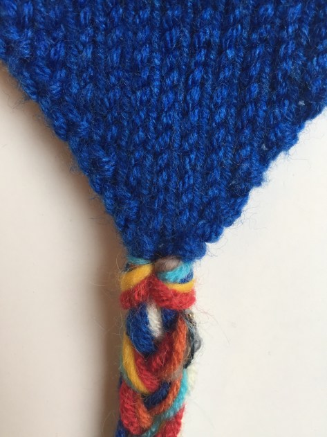 Choose Your Own Adventure Hat | Make this striped ear flap hat using yarn scraps of all different colors. Free pattern from alaskaknitnat.com