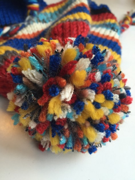 Choose Your Own Adventure Hat | Make this striped ear flap hat using yarn scraps of all different colors. Free pattern from alaskaknitnat.com