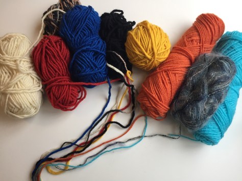 Choose Your Own Adventure Hat | Make this striped ear flap hat using yarn scraps of all different colors. Free pattern from alaskaknitnat.com