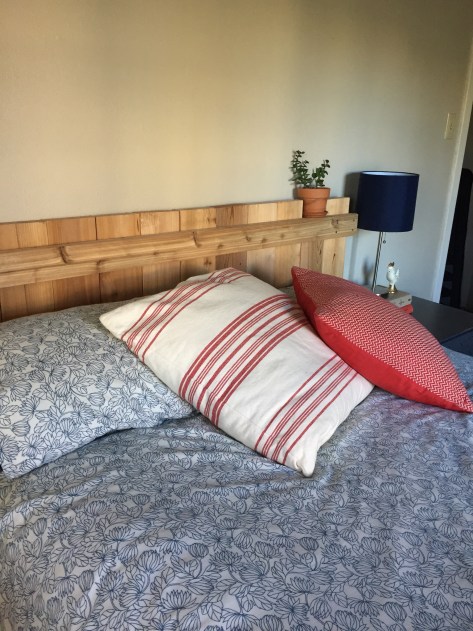 DIY Rustic Headboard | just a few unsanded cedar boards are all you need to easily create your own rustic headboard. Free tutorial from alaskaknitnat.com