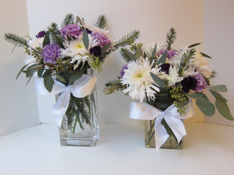 Winter Weddings: Purple carnations, white chrysanthemums, spruce sprigs and eucalyptus create a soft, festive look for any winter celebration | designed by Natasha Price of Alaskaknitnat.com