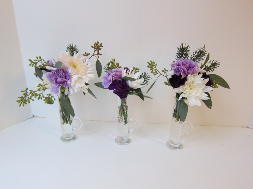 Winter Weddings: Purple carnations, white chrysanthemums, spruce sprigs and eucalyptus create a soft, festive look for any winter celebration | designed by Natasha Price of Alaskaknitnat.com