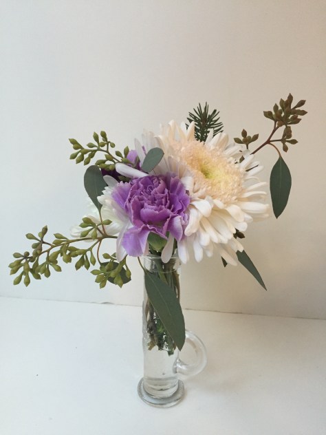 Winter Weddings: Purple carnations, white chrysanthemums, spruce sprigs and eucalyptus create a soft, festive look for any winter celebration | designed by Natasha Price of Alaskaknitnat.com