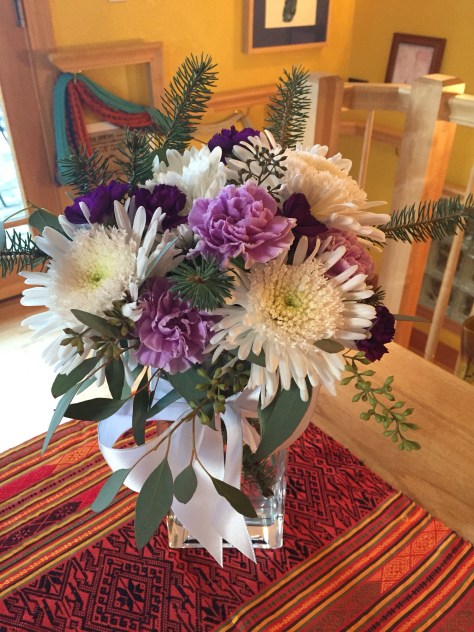 Winter Weddings: Purple carnations, white chrysanthemums, spruce sprigs and eucalyptus create a soft, festive look for any winter celebration | designed by Natasha Price of Alaskaknitnat.com