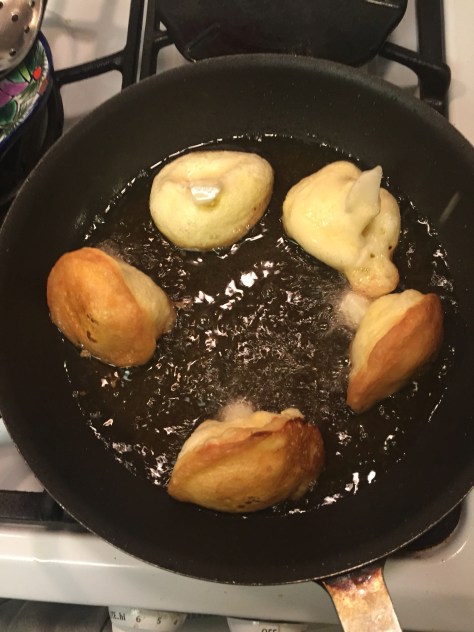 Moña's fried cauliflower | florets coated in a delicate egg batter, pan fried and tossed in a tomato sauce. It's the perfect side dish for any Mexican meal. Recipe from Alaskaknitnat.com