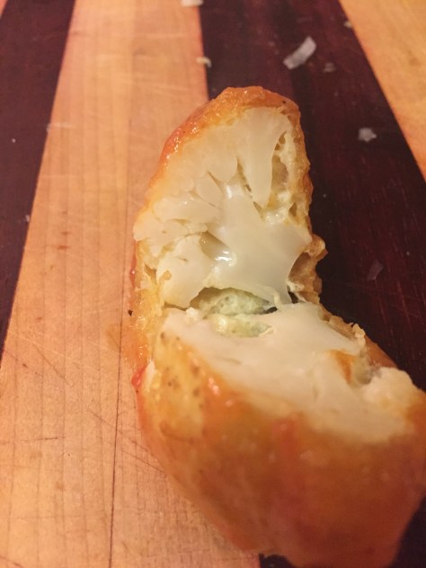 Moña's fried cauliflower | florets coated in a delicate egg batter, pan fried and tossed in a tomato sauce. It's the perfect side dish for any Mexican meal. Recipe from Alaskaknitnat.com