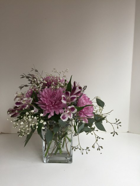 DIY Mother's Day arrangement | Make a beautiful floral centerpiece in just a few simple steps using eucalyptus, baby's breath, alstroemeria and football mums. Tutorial by alaskaknitnat.com