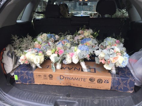 Garden roses, blue hydrangea, lisianthus, baby's breath limonium, seeded eucalyptus and dusty miller | Such a romantic, soft palate for a June wedding. Designed by Natasha Price of Alaskaknitnat.com