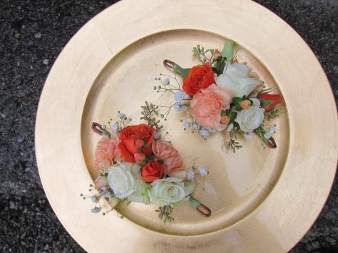 Corsages made with lisianthus, mini carnations, spray roses, hypericum berry , baby's breath and seeded eucalyptus | designed by Natasha Price of alaskaknitnat.com