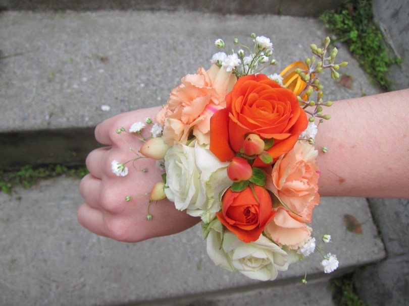 Corsages made with lisianthus, mini carnations, spray roses, hypericum berry , baby's breath and seeded eucalyptus | designed by Natasha Price of alaskaknitnat.com