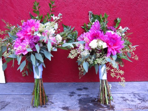 A stunning wedding bouquet with a dinner plate dahlia, gold eucalyptus, ferns, myrtle, waxflower and spray roses | Designed by Natasha Price of alaskaknitnat.com