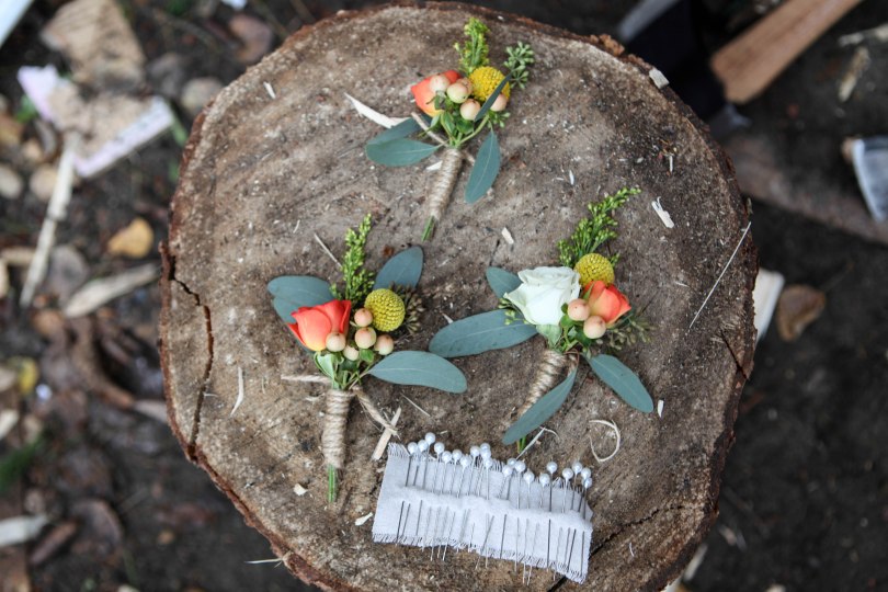 Autumn boutonnieres with orange spray rose, billy ball, hypericum, solidago and seeded eucalyptus | designed by Natasha Price of alaskaknitnat.com