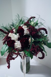 Burgundy and white wedding | a bridal bouquet with carnations, roses, amaranthus, lisianthus, tree fern, eucalyptus and salal. Perfect for a winter wedding. | designed by Natasha Price of alaskaknitnat.com