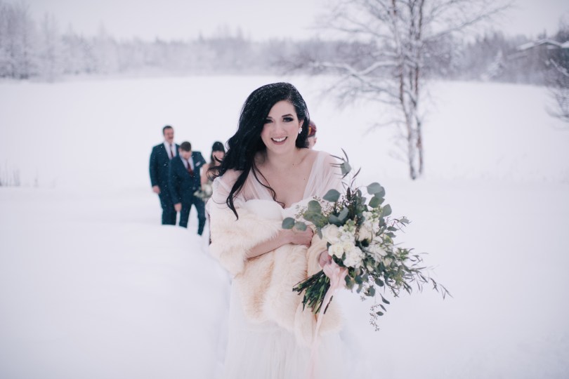 The perfect winter wedding bouquet | roses, stock, waxflower and carnation mixed with eucalyptus. Flowers by Natasha Price and photo by Erica Rose Photography