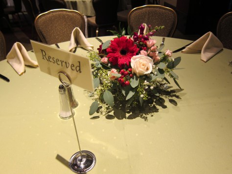 Red and white wintertime centerpiece designed by Natasha Price of Alaskaknitnat.com | Photo by Grace Adams Photography