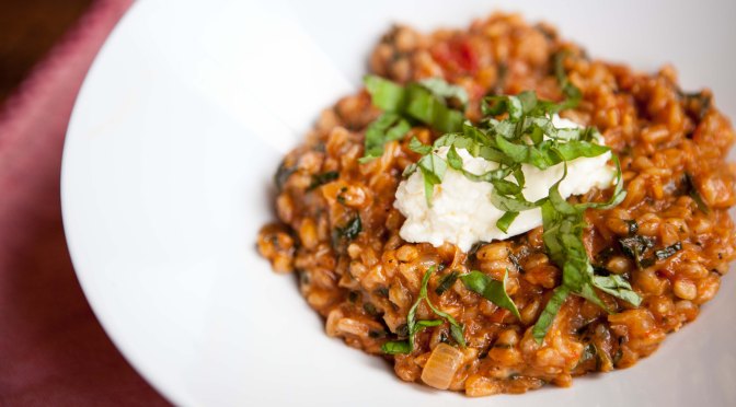 Tomato Farrotto with Spinach and Ricotta